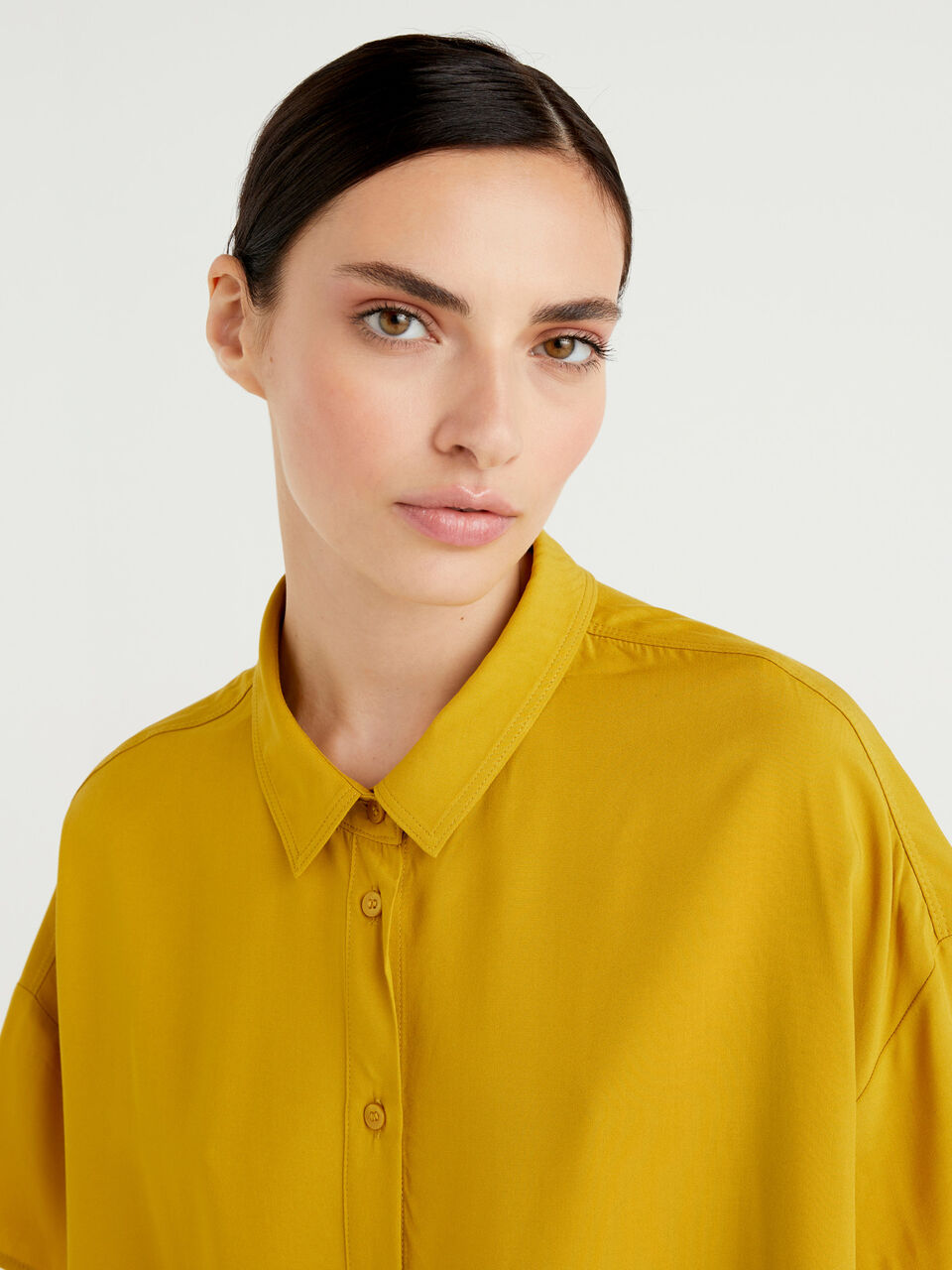 yellow flowy shirt
