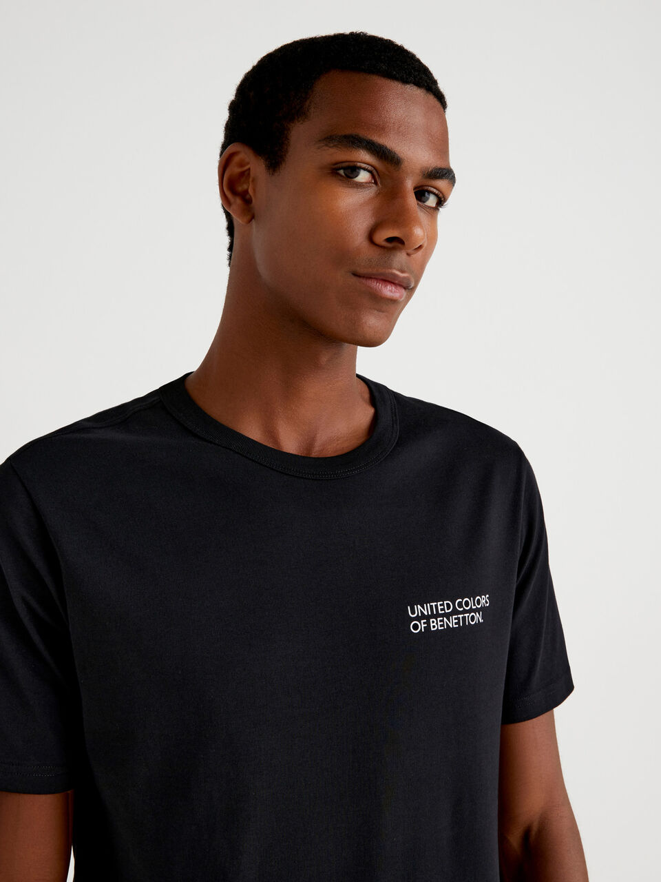 Black t-shirt with logo print - Black | Benetton