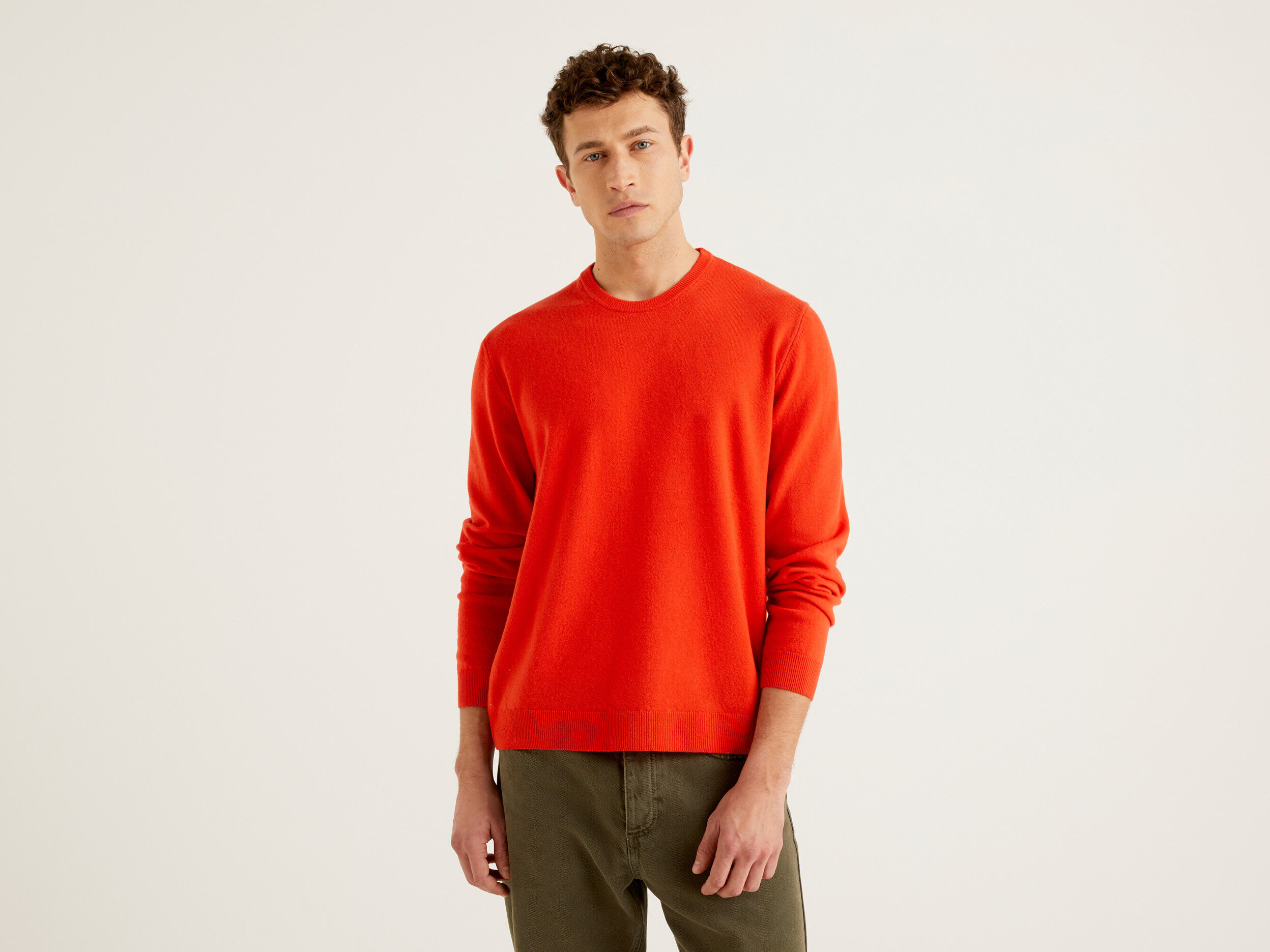 Orange crew neck sweater in pure Merino wool Orange Benetton
