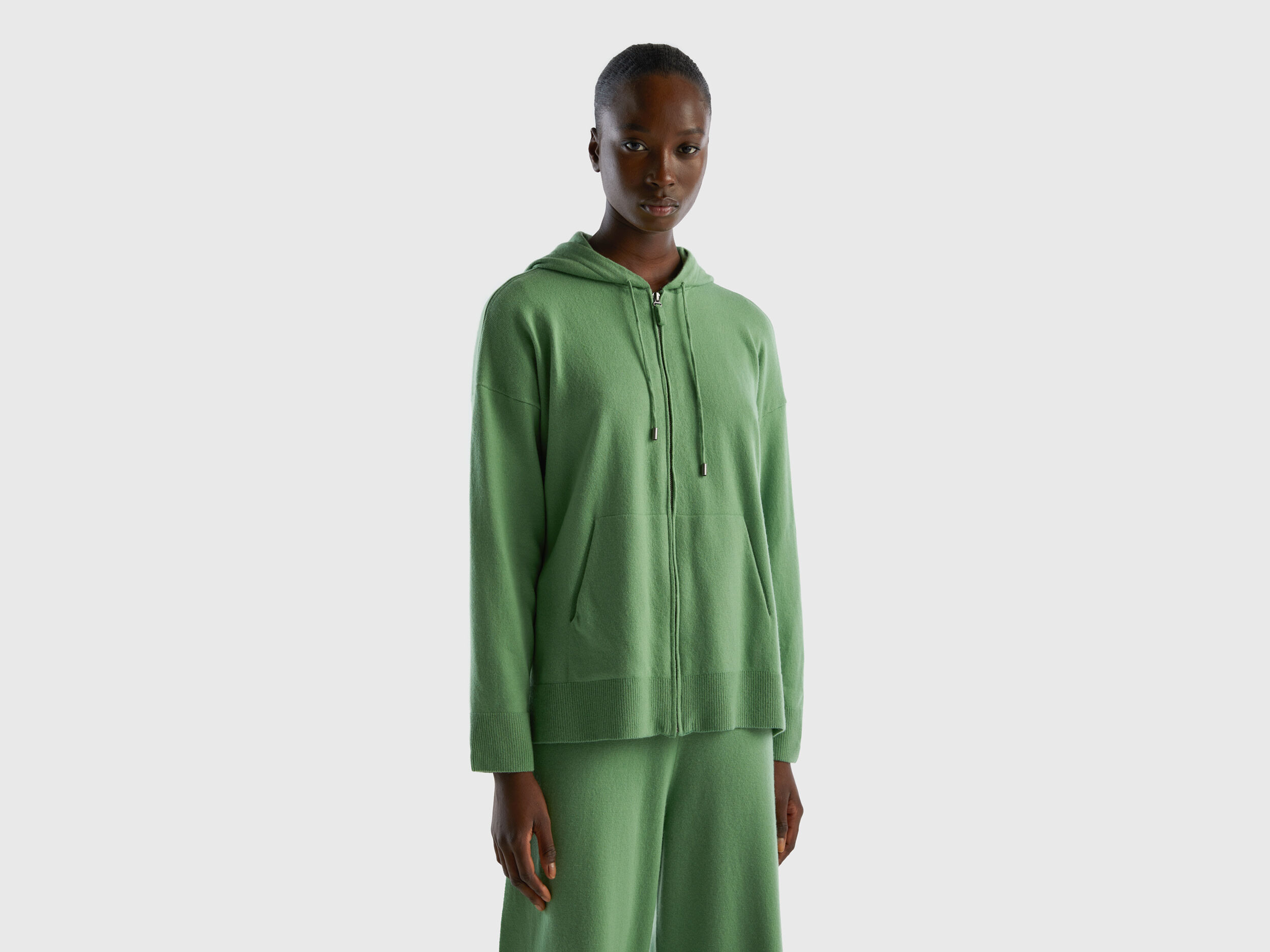 Sage green sweater in cashmere blend with hood Green Benetton