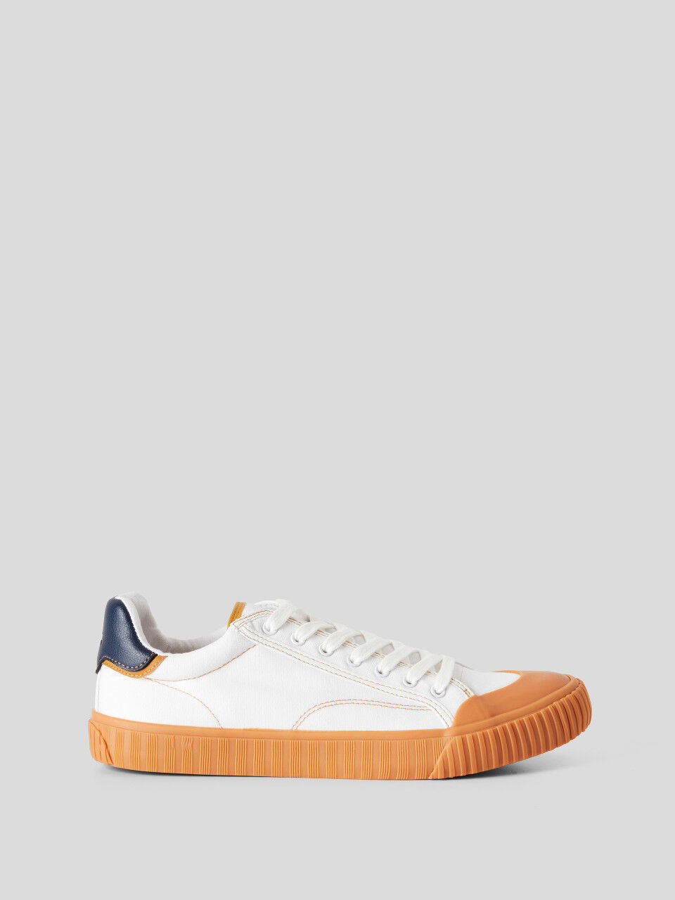 Ucb orange sneakers store