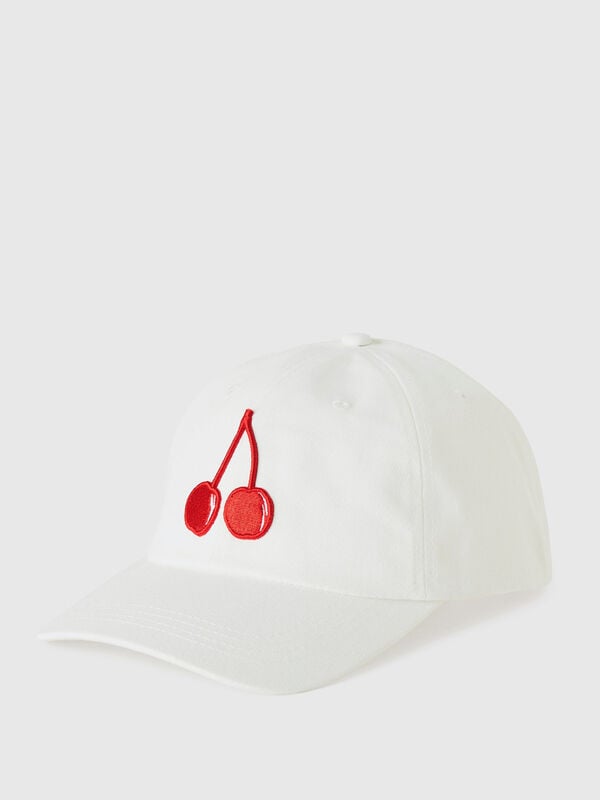 White cap with embroidered cherry