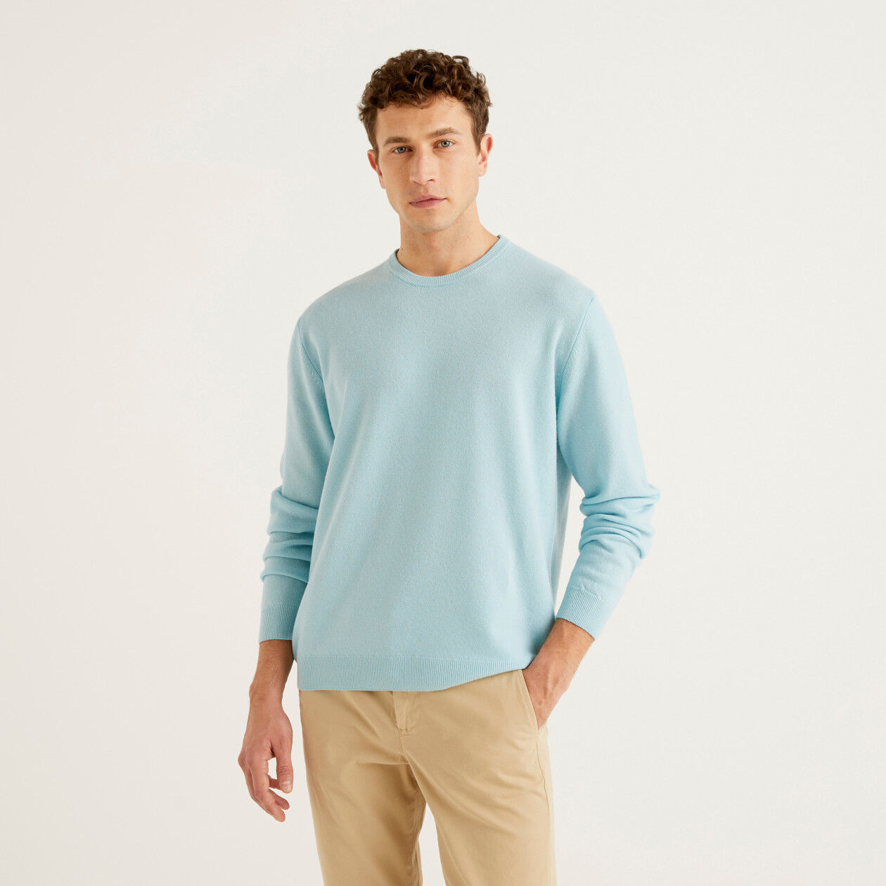 Turquoise crew neck sweater in pure Merino wool Turquoise Benetton