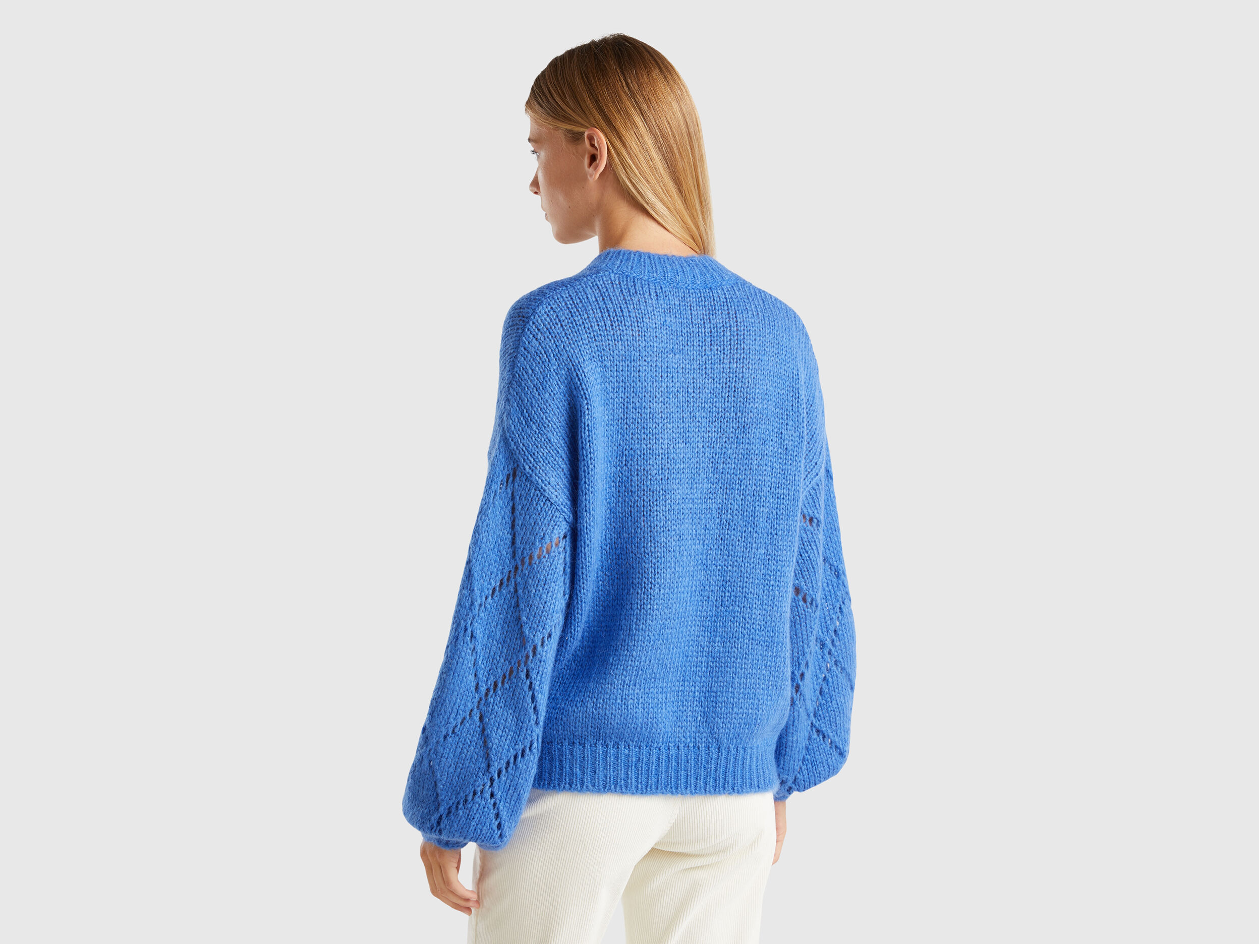 Sweater with perforated sleeve - Blue | Benetton