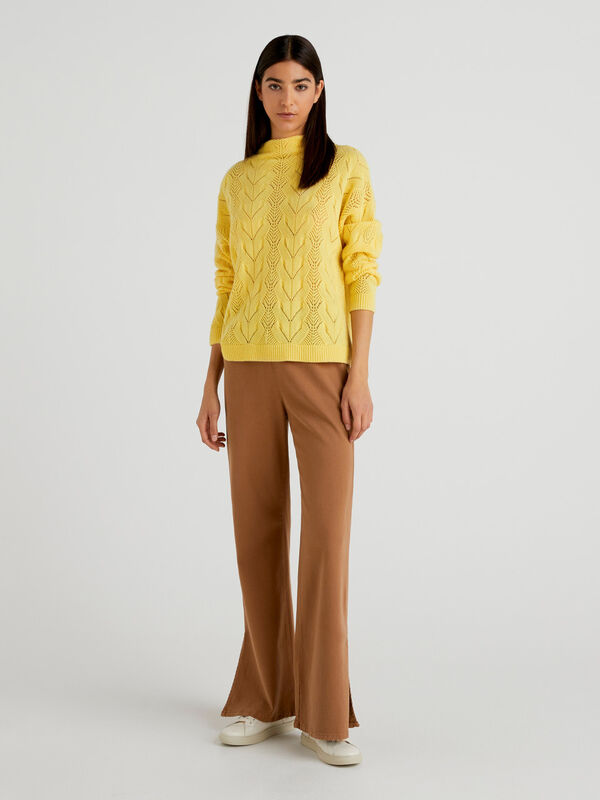 Flared trousers with slits Women
