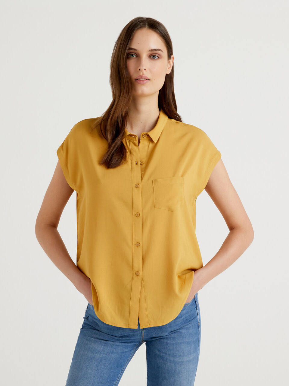 yellow flowy shirt