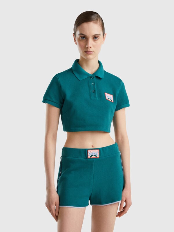 Cropped dark green polo with logo patch Women