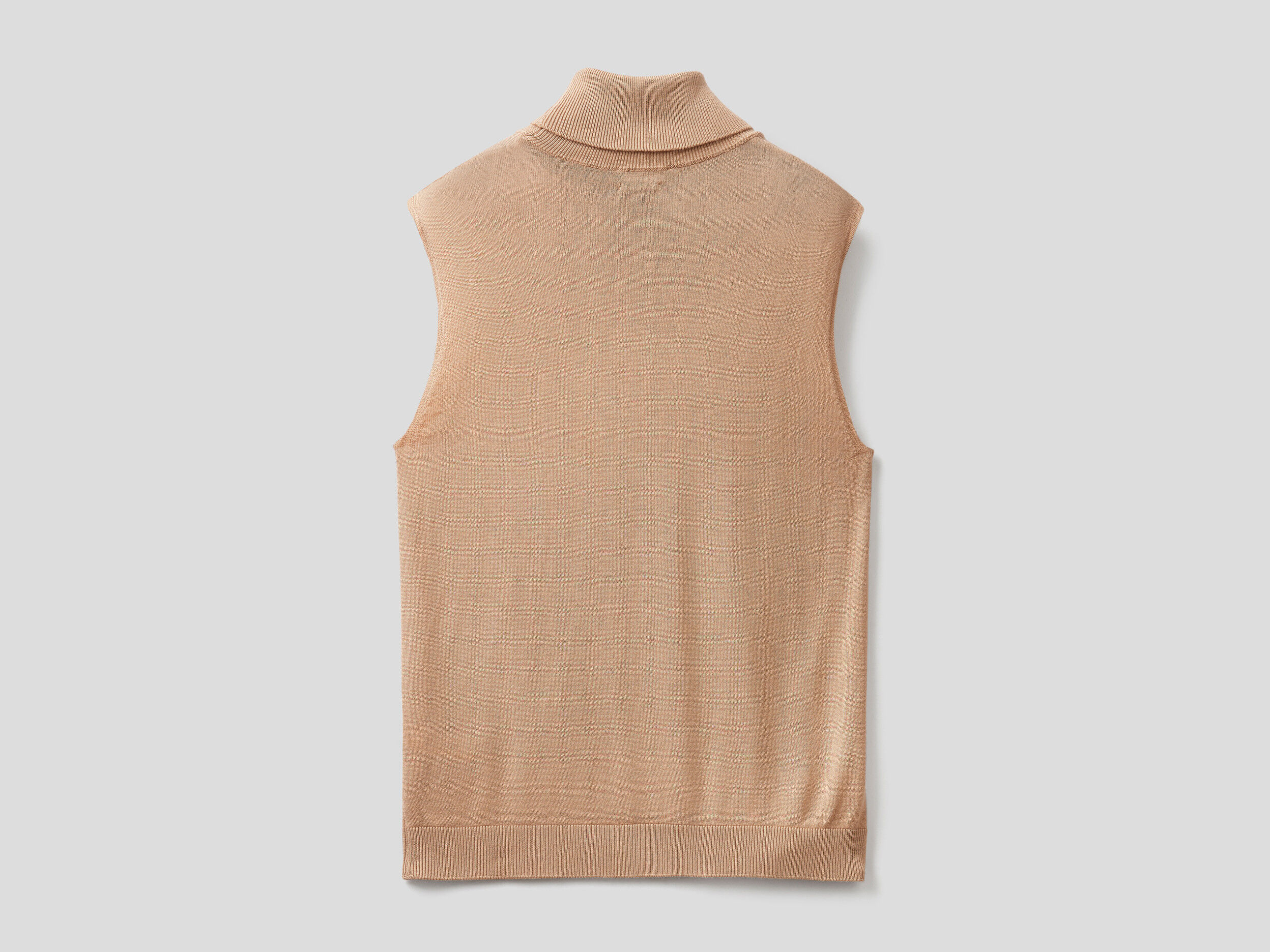 Tan top sleeveless turtleneck