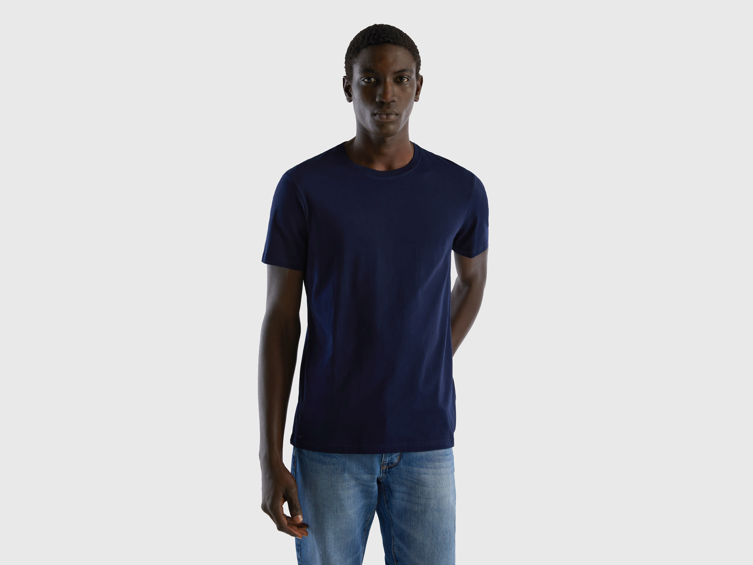 Navy blue shirt with dark blue jeans store