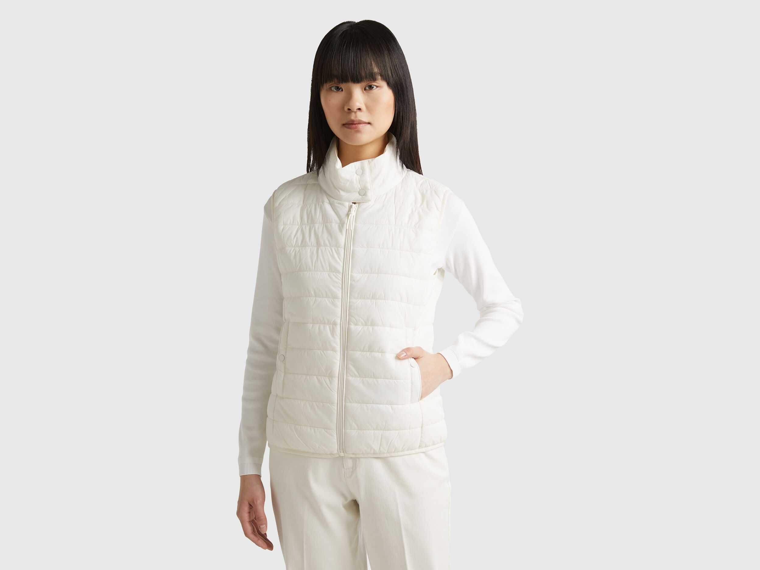 White sleeveless puffer jacket on sale