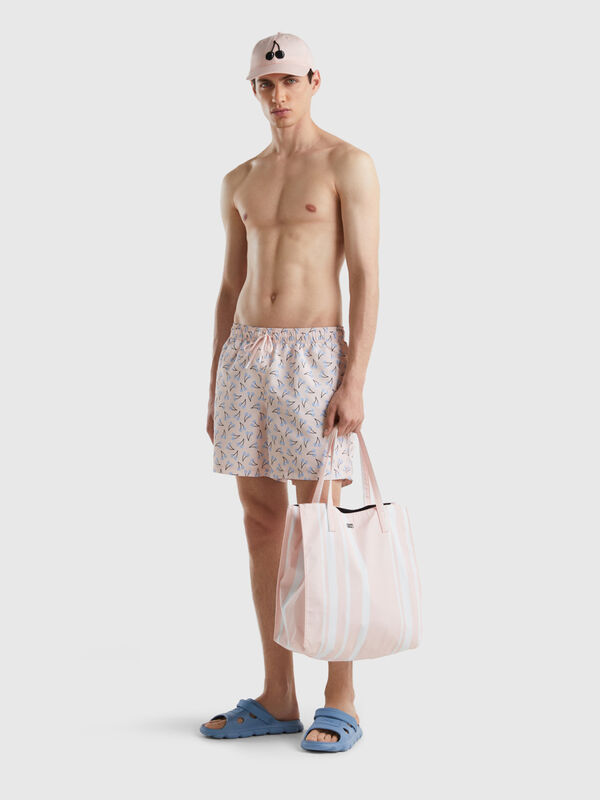 Light pink swim shorts with cherry pattern Men