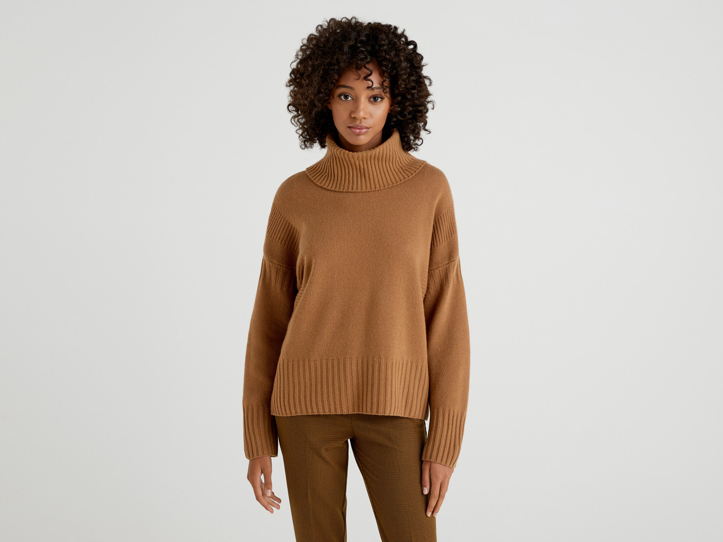 Camel colored turtleneck top