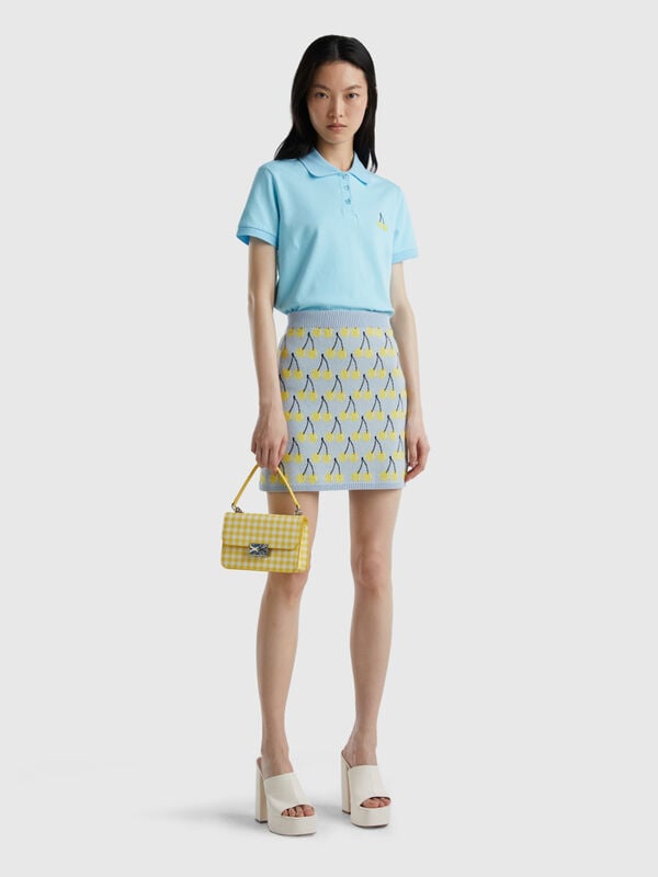Light blue polo with cherry embroidery Women