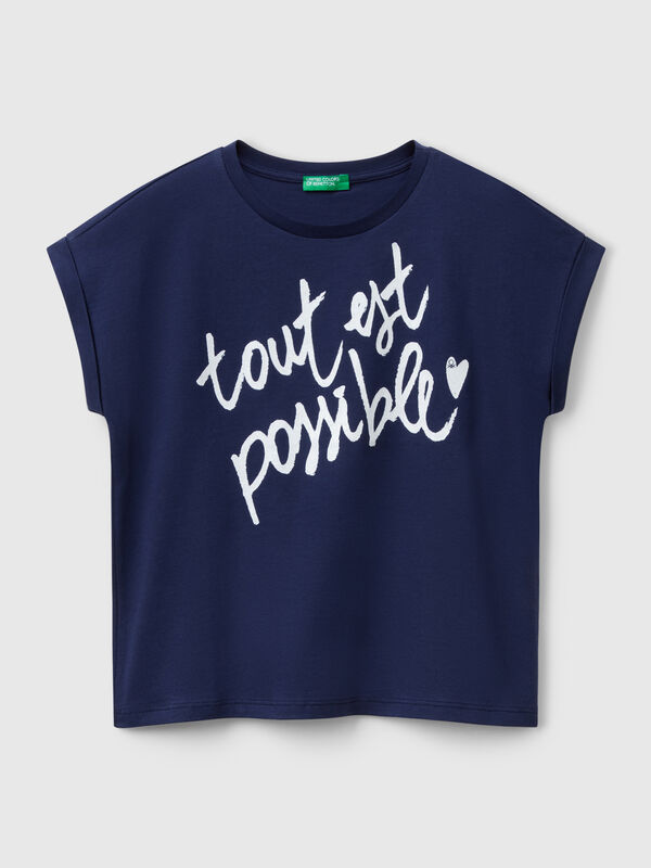 Camiseta boxy fit con estampado y purpurina Niña