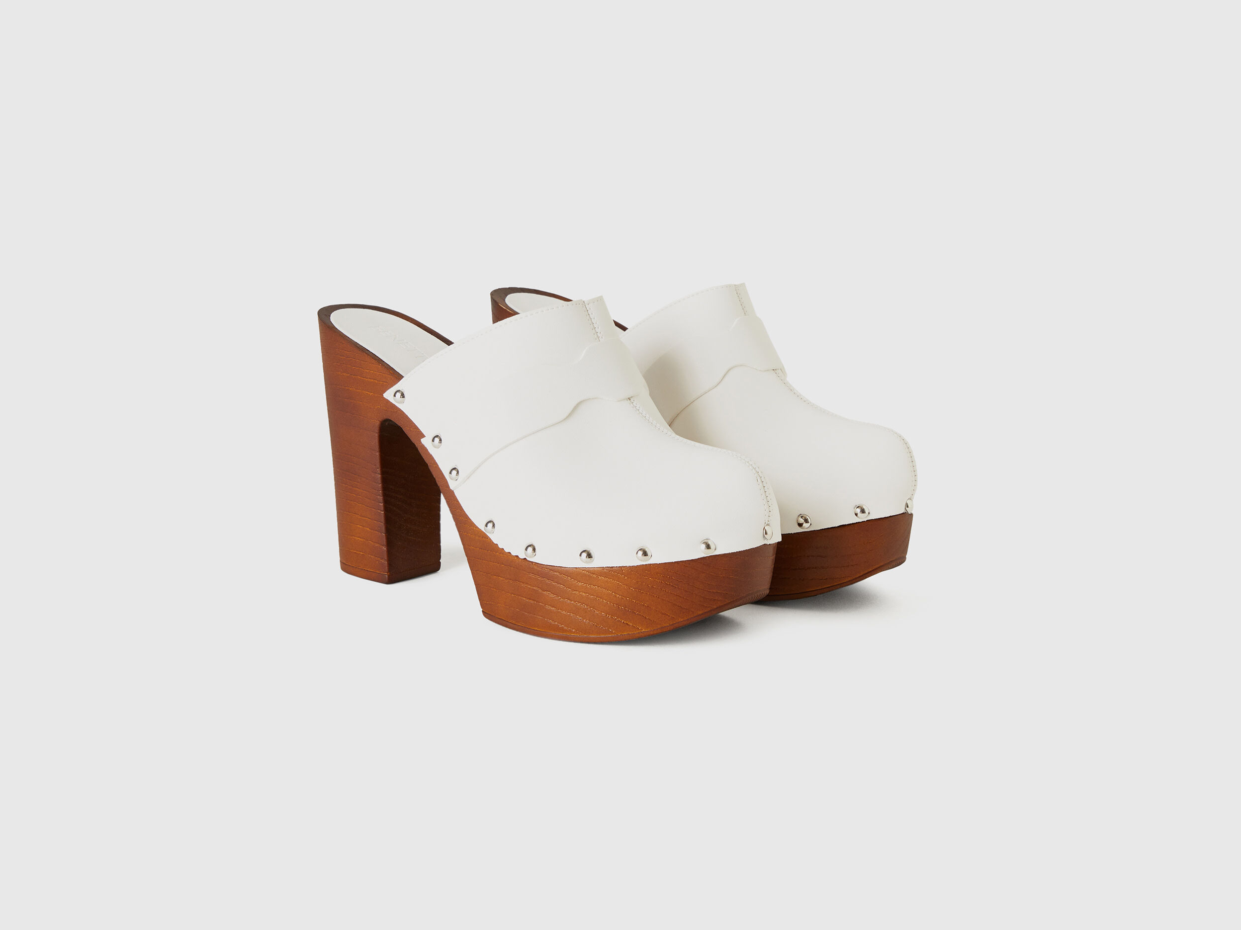 Clogs with heel and studs White Benetton