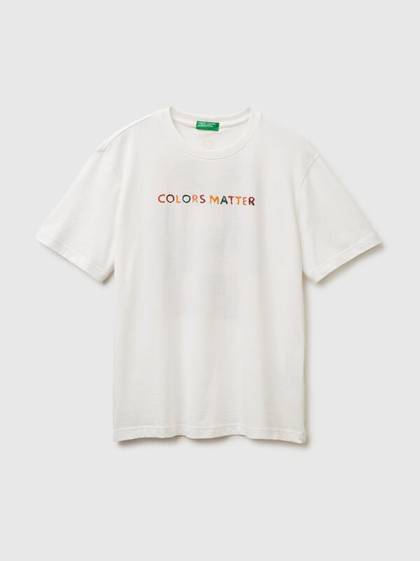 Camiseta de corte relajado con estampado delantero y trasero. Hombre