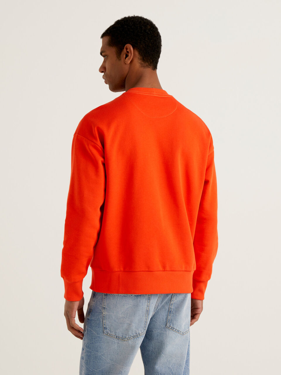 Orange sweatshirt in organic cotton | Benetton - Orange
