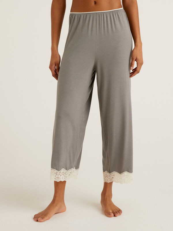 Cropped trousers with lace details Women