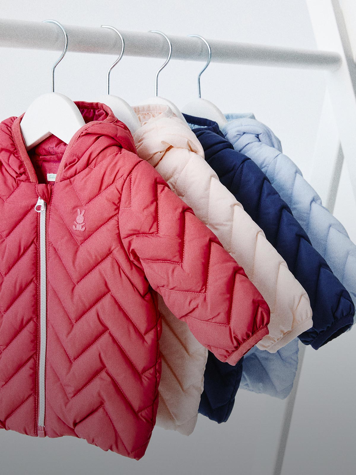 novedades <span class="text-l playful">recién nacido</span> benetton