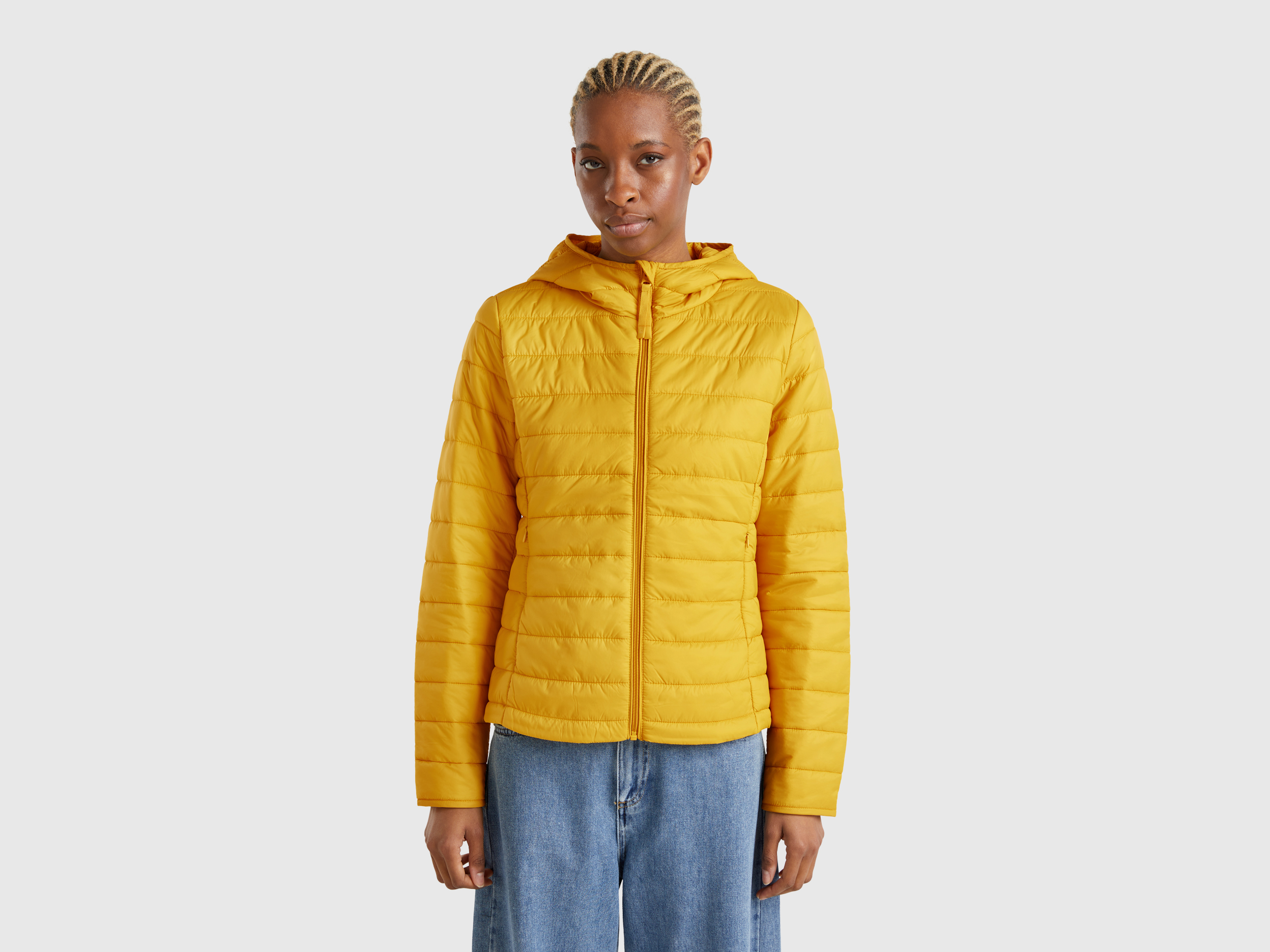 Sleeveless slim fit jacket with padding - Mustard | Benetton