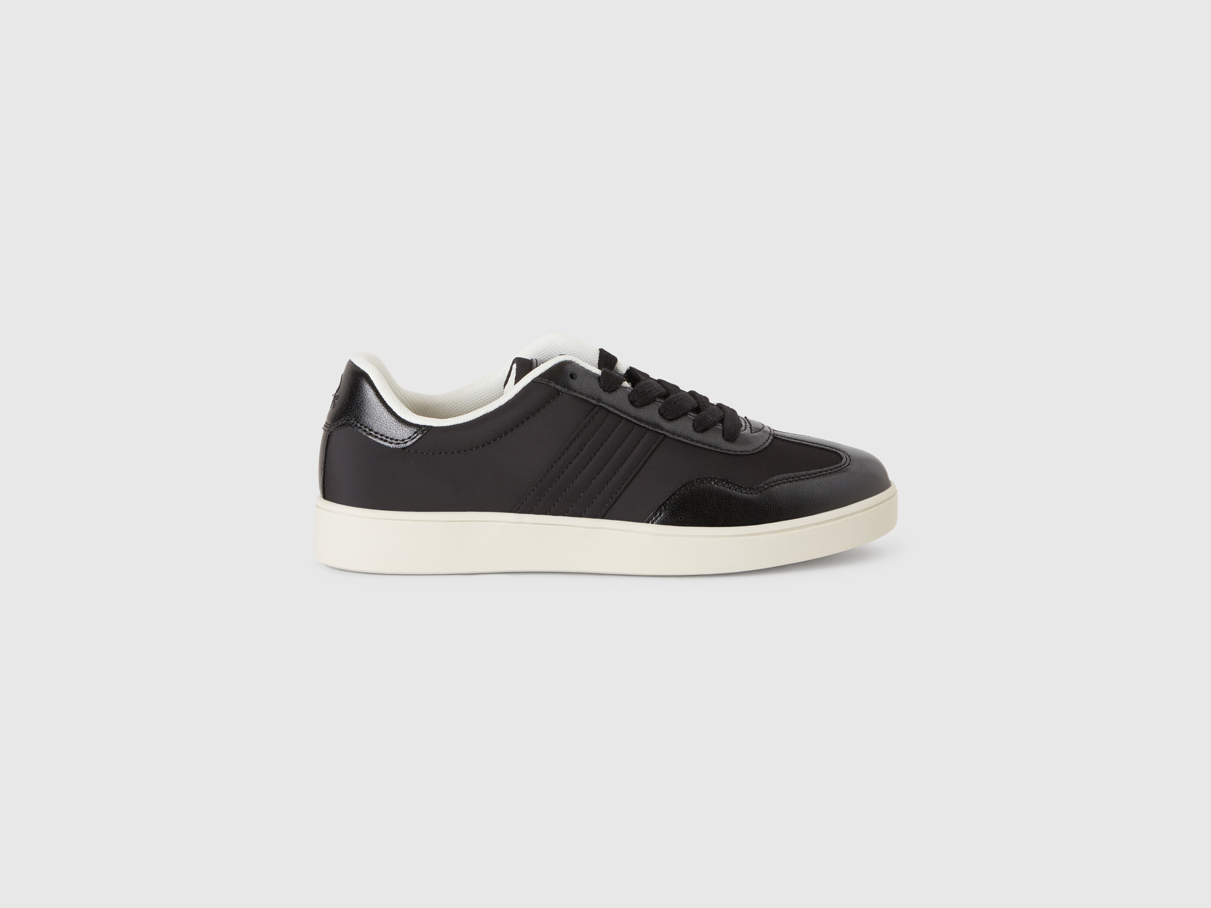 Low-top sneakers with knit stitch blend - Black | Benetton